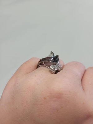 Lot 97 - A DIAMOND CLUSTER RING, pavé set in 14ct white...