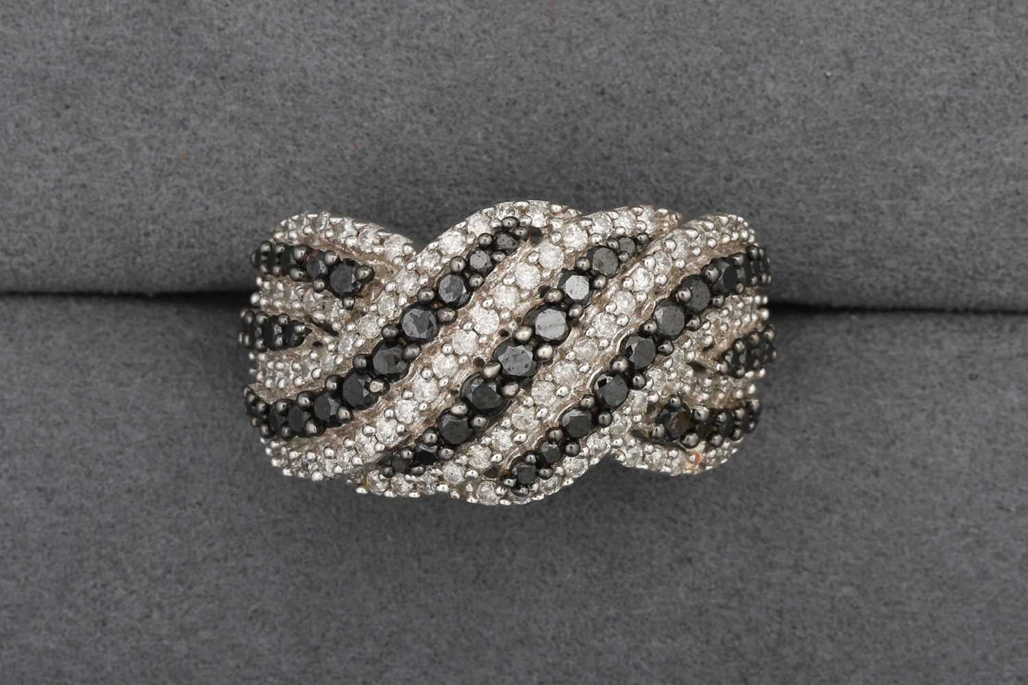 Lot 98 - A DIAMOND CLUSTER RING, multi-rowed, mounted...