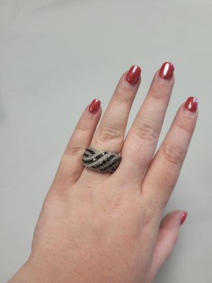 Lot 98 - A DIAMOND CLUSTER RING, multi-rowed, mounted...