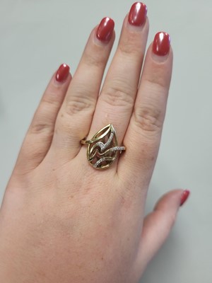Lot 100 - A DIAMOND SET RING, of open work pear shaped...