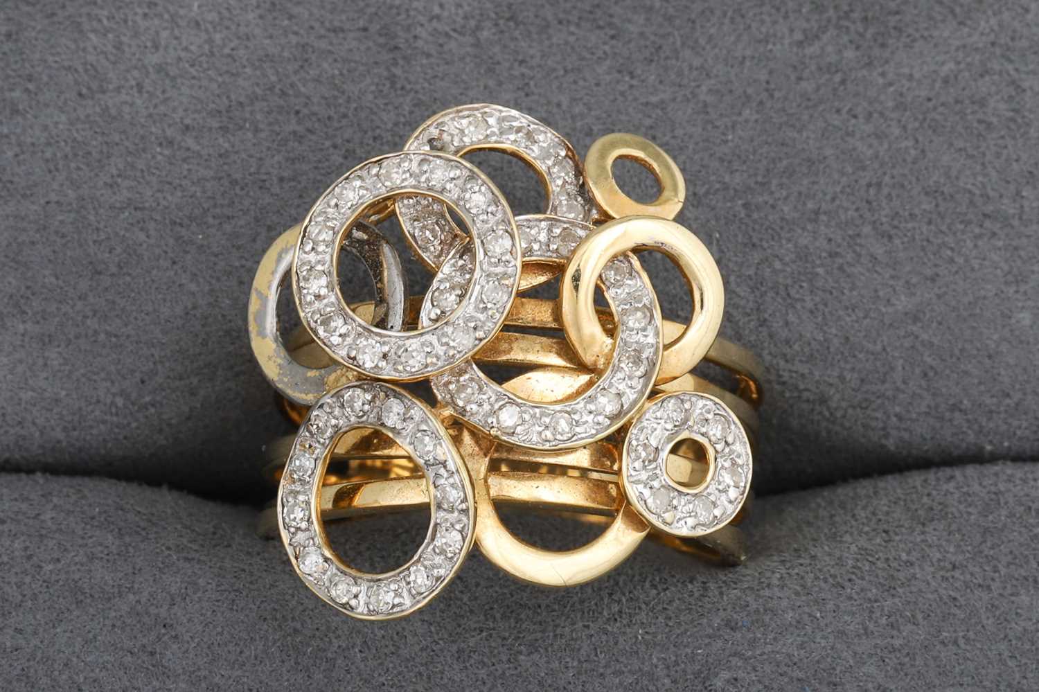 Lot 102 - AN UNUSUAL DIAMOND CLUSTER RING, intersecting...