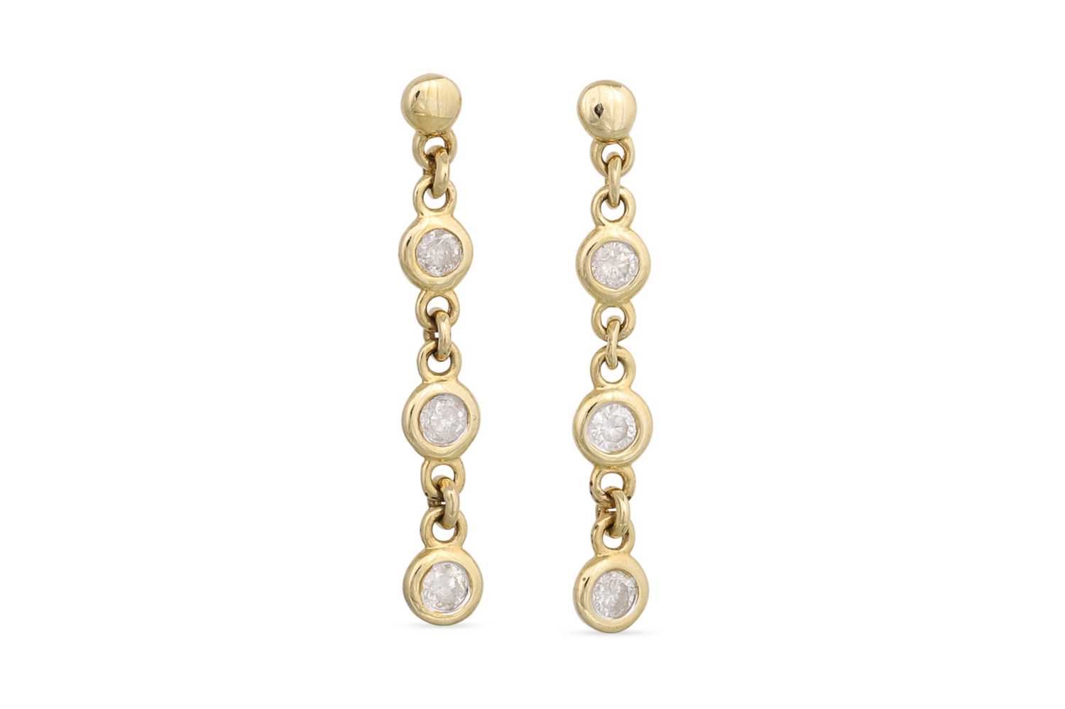 Lot 16 - A PAIR OF DIAMOND DROP EARRINGS, the bezel set...
