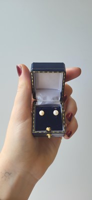 Lot 17 - A PAIR OF CULTURED PEARL EARRINGS, mounted in...