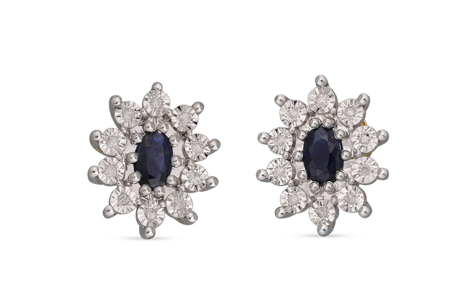 Lot 18 - A PAIR OF DIAMOND AND SAPPHIRE CLUSTER...