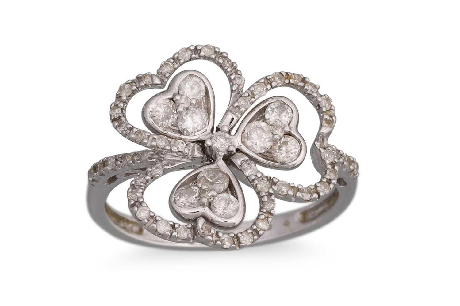 Lot 27 - A DIAMOND CLUSTER RING, in the form of a...