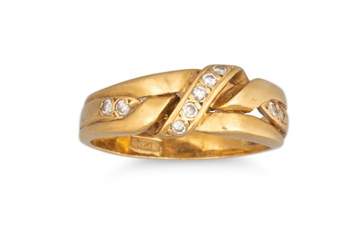 Lot 392 - AN 18CT GOLD RING, set with diamonds, 4.2 g....