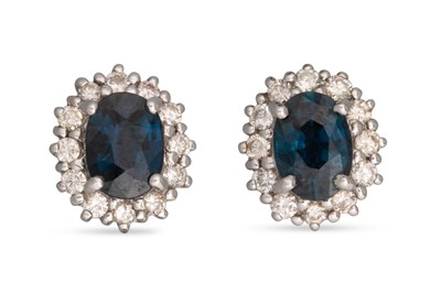 Lot 217 - A PAIR OF SAPPHIRE AND DIAMOND CLUSTER...