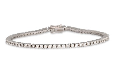 Lot 220 - A DIAMOND LINE BRACELET, mounted in 18ct white...