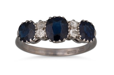 Lot 337 - A VINTAGE SYNTHETIC SAPPHIRE AND DIAMOND RING,...