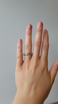 Lot 44 - A DIAMOND SET ETERNITY RING, the round...