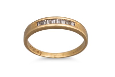 Lot 5 - A DIAMOND HALF ETERNITY RING, the baguette cut...