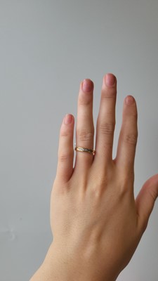 Lot 5 - A DIAMOND HALF ETERNITY RING, the baguette cut...