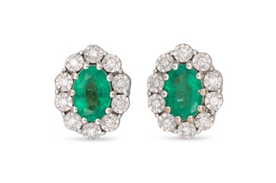 Lot 118 - A PAIR OF EMERALD AND DIAMOND OVAL CLUSTER...