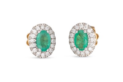 Lot 123 - A PAIR OF EMERALD AND DIAMOND STUD CLUSTER...