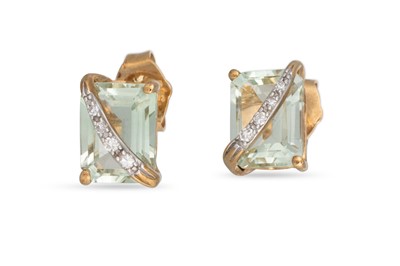 Lot 187 - A PAIR OF OLIVINE STUD EARRINGS, with diamond...