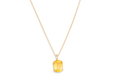 Lot 214 - A CITRINE AND DIAMOND PENDANT, mounted in 18ct...