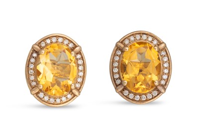 Lot 185 - A PAIR OF CITRINE AND DIAMOND STUD CLUSTER...