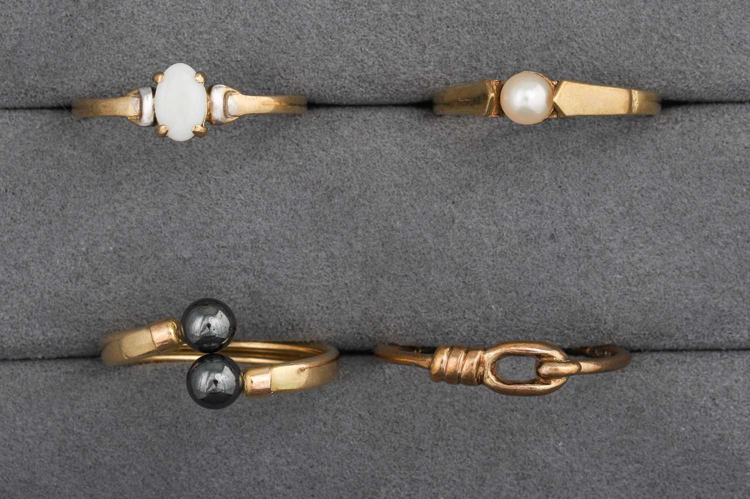Lot 16 - FOUR 9CT GOLD RINGS, one pearl set