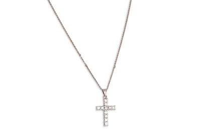 Lot 346 - A DIAMOND SET CROSS, the round brilliant cut...