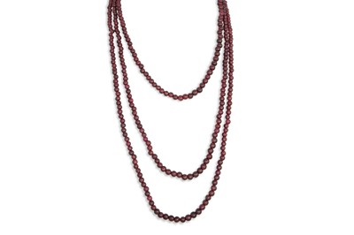 Lot 348 - A THREE ROW RHODOLITE GARNET NECKLACE, to a...