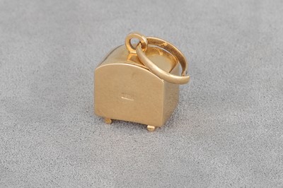 Lot 31 - A VINTAGE CHARM, in the form of a television...