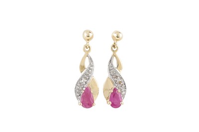 Lot 4 - A PAIR OF RUBY EARRINGS, pear shaped, set with...
