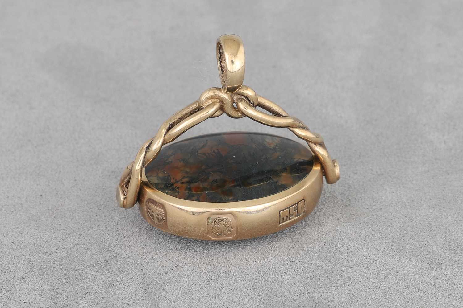 Lot 34 - A 9CT GOLD STONE SET SWIVEL SEAL, 12.3 g.