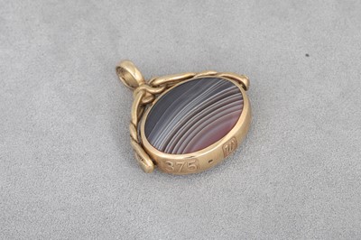 Lot 34 - A 9CT GOLD STONE SET SWIVEL SEAL, 12.3 g.