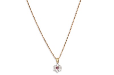 Lot 163 - A RUBY AND DIAMOND CLUSTER PENDANT, mounted in...
