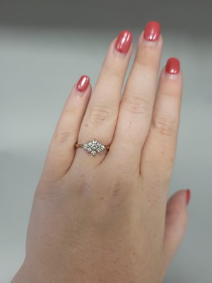 Lot 1 - A DIAMOND CLUSTER RING, mounted in 18ct white...