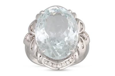 Lot 381 - AN AQUAMARINE AND DIAMOND SET DRESS RING,...