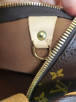 Lot 416 - A LOUIS VUITTON "KEEP ALL TRAVEL BAG" coated...
