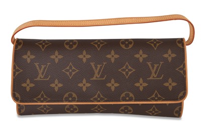 Lot 418 - A LOUIS VUITTON POCHETTE TWIN HANDBAG, long...