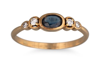 Lot 267 - A SAPPHIRE AND DIAMOND DRESS RING, the oval...
