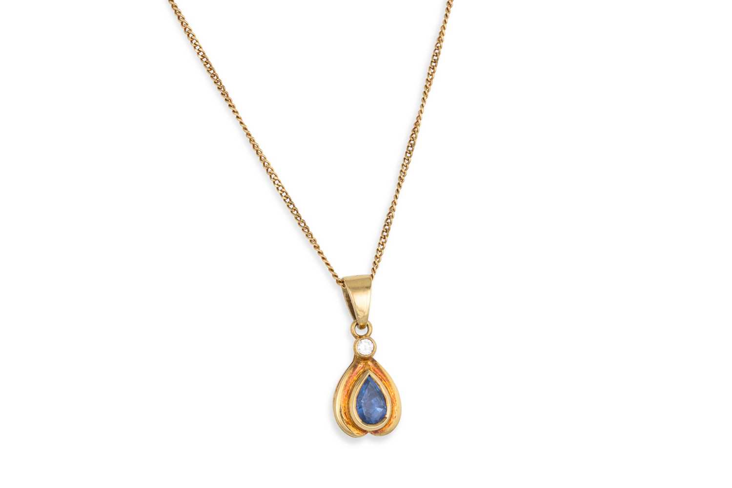 Lot 52 - ASAPPHIRE AND DIAMOND SET PENDANT, the round...