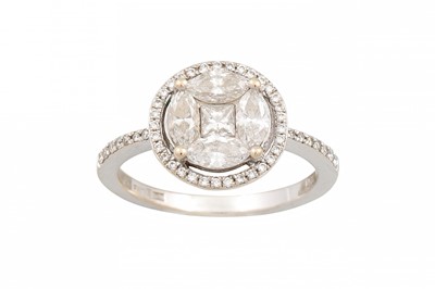 Lot 53 - A DIAMOND CLUSTER RING, the centre princess...