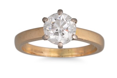 Lot 222 - A DIAMOND SOLITAIRE RING, claw set in 18ct...