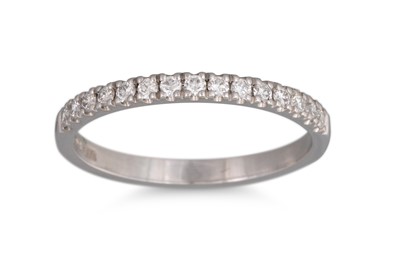 Lot 152 - A DIAMOND HALF ETERNITY RING, mounted in...