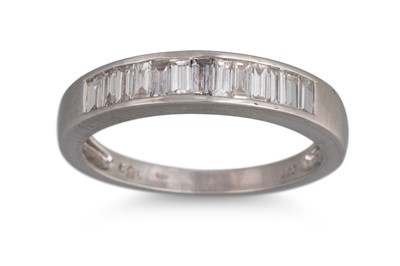 Lot 326 - A DIAMOND HALF ETERNITY RING, the channel set...