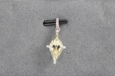 Lot 143 - A YELLOW QUARTZ AND DIAMOND PENDANT, mounted...