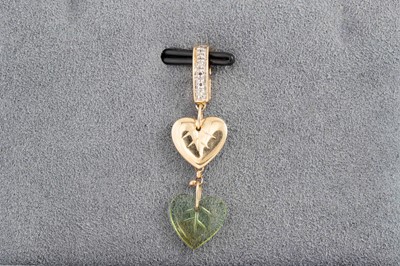 Lot 148 - A PERIDOT AND DIAMOND DROP PENDANT, heart...