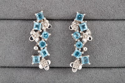 Lot 150 - A PAIR OF BLUE TOPAZ AND DIAMOND DROP EARRINGS,...
