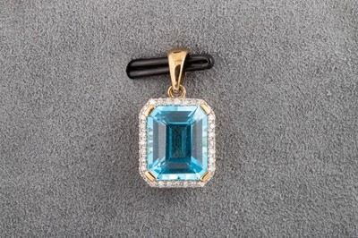 Lot 156 - A BLUE TOPAZ AND DIAMOND CLUSTER PENDANT, of...