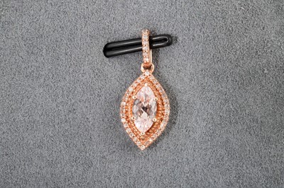 Lot 162 - A MORGANITE AND DIAMOND PENDANT, cluster...