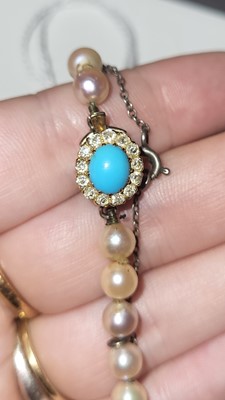 Lot 1 - AN ANTIQUE STRING OF CULTURED PEARLS, to a...