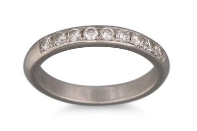 Lot 399 - A DIAMOND HALF ETERNITY RING, mounted in...