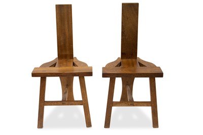 Lot 498 - A SET OF SIX TUAM CHAIRS, African wood, with...