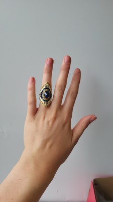Lot 81 - A SILVER GILT RING, set with enamel and...