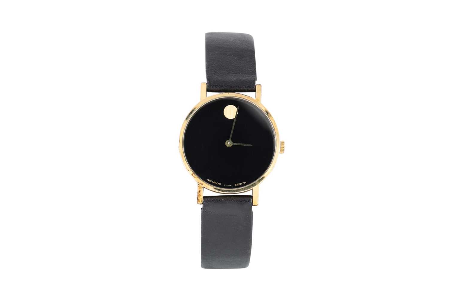 Lot 88 - A GOLD PLATED MOVADO WRIST WATCH, black face,...