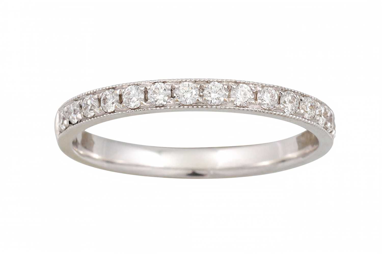Lot 146 - A DIAMOND HALF ETERNITY RING, mounted in white...